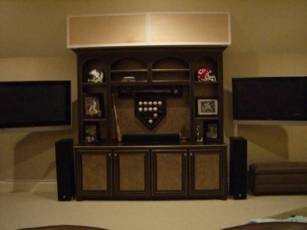 We custom built the soffit at the top to conceal a motorized drop down screen.